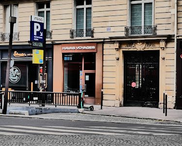 Salaün Holidays - Enseigne Havas Paris 16ème
